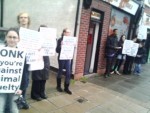 protesters moments before the owners shut the shop an hour early and left