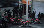 Roving security forces on motorbikes.