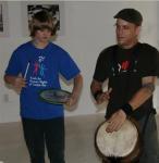 Youth for Human Rights Florida member beats his drum for Haitian Orphans