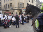 We wait at Carfax whilst a police horse looks on