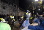 Police Horses Push Crowd Back