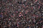 Egyptians protest at Tahrir Square on the day Mubarak left office, 11 February.