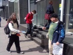 BoS customers and passers-by exchange leaflets