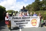 locals & campaigners in front of occupied truck