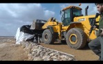 Video screenshot JCB machine demolishing Palestinian property in Umm Fagarah