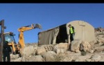 Video screenshot: JCB machines used in demolition at Bir al-Eid village