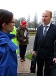 Activist trying to persuade local councillor not to make cuts.