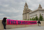 in front of the liver building with help of a couple of dutch tourists