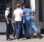 EDL bloke scuffles with cops and is close to arrest 6/6/13