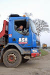 Alan's Skip Hire truck waiting to join main road