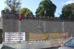 Banners on the fence round Cardiff Castle on Sunday
