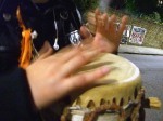Noise at the protest was provided variously by drums...