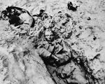 Dead Nazi officer in snow, Mabompre, Belgium, 1944