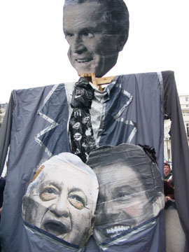 Pix of puppets and placards at peace demo