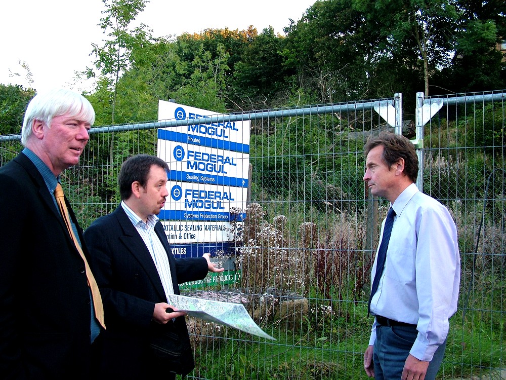 Chris Davies MEP (right) and Paul Rowen MP (left) view destroyed woodland