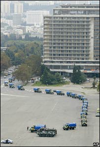 Azeri armoured vehicles and police jeeps line up in a show of force