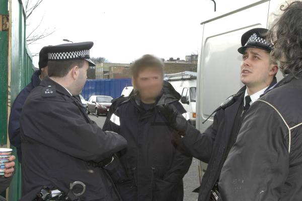 Police visit the site and talk to a few supporters