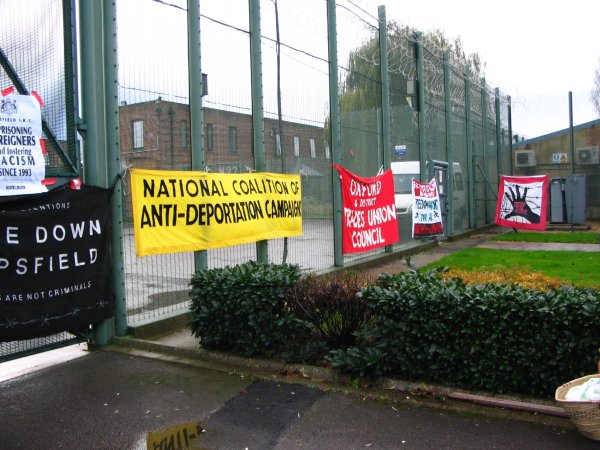 banners on the razorwire fence