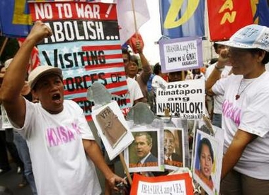 Protesters shout slogans during a rally near the U.S. embassy in Manila
