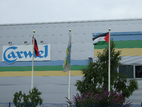 Palestinian flag flying over Carmel-Agrexco