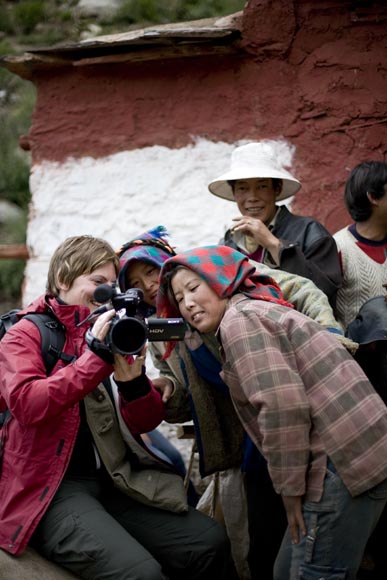Lara Damiani with Tibetans at Drigung Tel Monastery in July