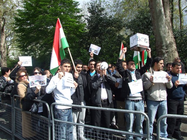 shouting anti-Syrian government slogans