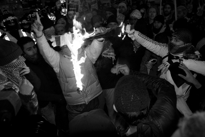 Israeli flag goes up in flames outside the embassy. 2009