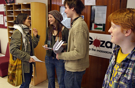 Handing out flyers explaining the occupation and its demands