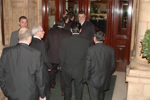 Delegates for a conference enter hotel