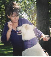 Liz Tolbert with "Leo" a service dog she trained while in prison