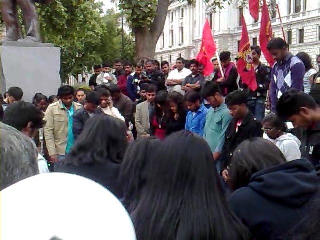 Students lead the final 2 minute silence at Parliament Square