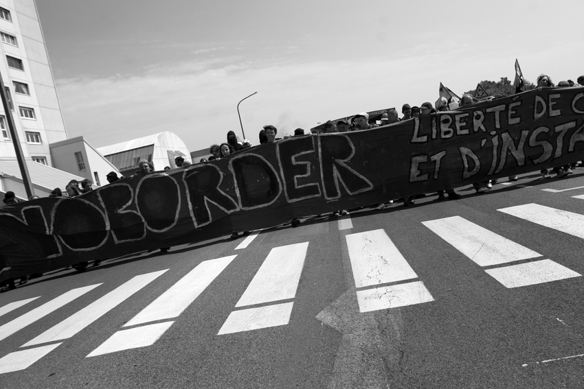 Calais. The front of the No Borders march. June 2009.