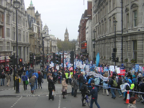 View of part of de demo marching down Whitehall