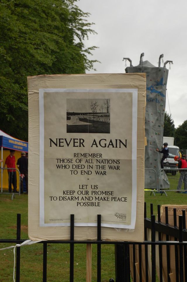 'Never again' placard at main entrance